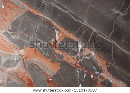 Marble with pink and red veins, called Caravaggio