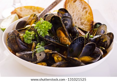 mussels cooked Royalty-Free Stock Photo #131021525