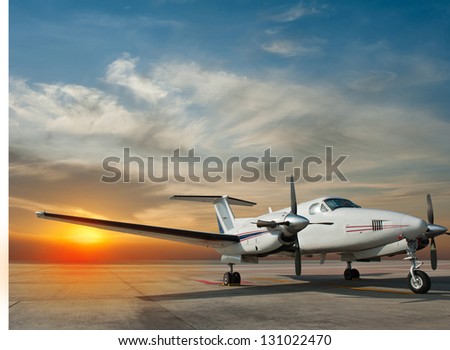 Propeller plane parking at the airport Royalty-Free Stock Photo #131022470
