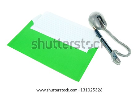 Envelope with pen isolated on white