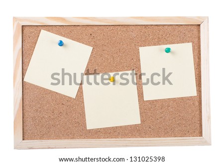 Cork board with sticky notes pinned isolated on white background.