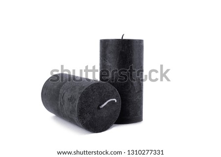 black candles on white background