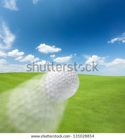 Golf Ball flying in the field