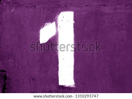 Number 1 in stencil on metal wall in purple color. Abstract background and texture for design.