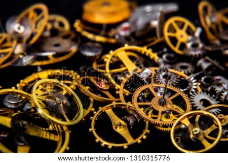 Vintage cogs gears wheels collection set on black background