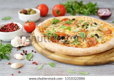 Italian pizza with ingredients. Close up view