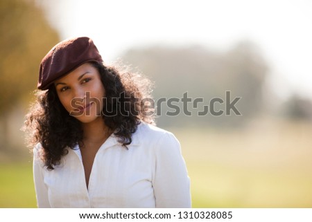 Portrait of woman wearing flat cap