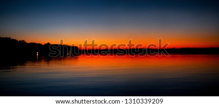 Majestic sunset over water