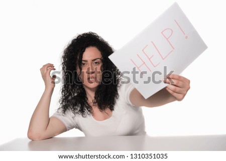 unhappy woman holding HELP sign isolated