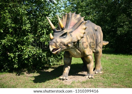 Dinosaur Triceratops in the Park Royalty-Free Stock Photo #1310399416
