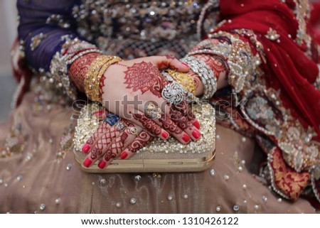 Beautiful Bride Hands with Stylish mehndi. High Resolution Image. Beautiful Woman's beautiful hands. Beautiful Bride. Asian Bride. Wedding Photography.