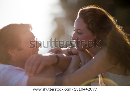 A couple enjoying the sunshine together