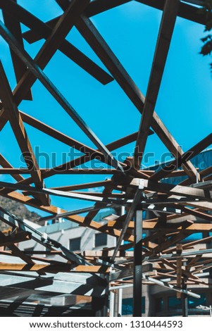 Metal structure with blue background