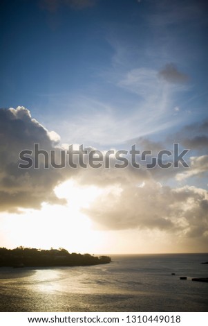 Beautiful sunset and clouds above a harbor
