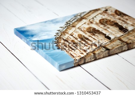 Canvas print. Photo with gallery wrap method of canvas stretching on stretcher bar. Photography with image of the ancient Roman amphitheatre in Nimes city, France
