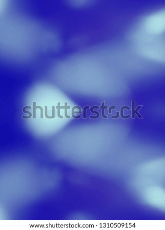 Heart shaped out of focus lights coming from the mother nature with abstract background of Blue color. Abstract background of Blue and white color. Good for Valentines Day celebrations. 
