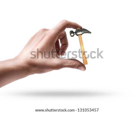 Man's hand holding Hammer isolated on white background