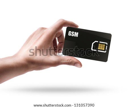Man's hand holding black GSM sim card isolated on white background