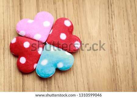 Mini heart on wooden table for valentine's day, creative concept for lovely thing 