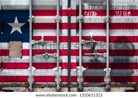 Close-up of the container with the national flag of Liberia. The concept of Liberia  export-import and national delivery of goods.