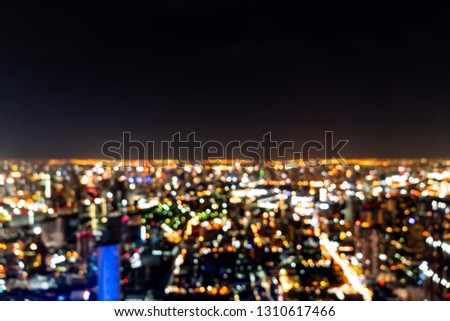abstract blur Bangkok cityscape at night in Thailand for background