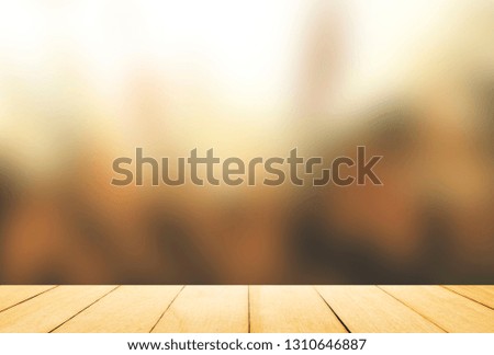 Wooden mockup and empty floor ground for Advertising and product design with blurred brown background.
