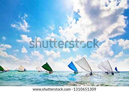 Sail boats race in Serdang beach festival, Belitung, Indonesia