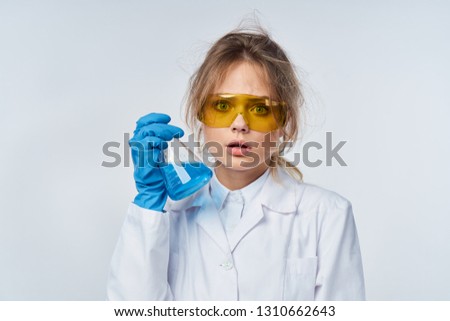laboratory assistant conducts experiments                              