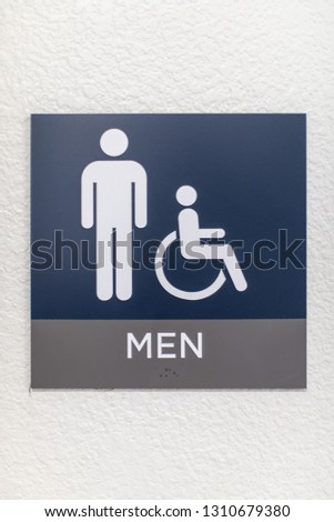Blue mens bathroom sign on a white wall