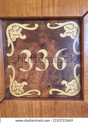 wooden board with room number