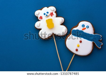Handmade gingerbread snowman and teddy bear