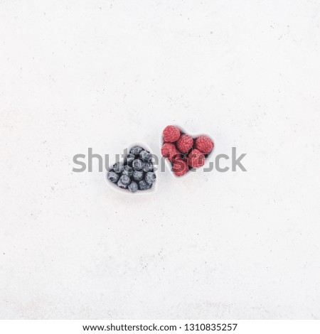 Creative Valentine Day romantic concept composition flat lay top view love holiday celebration red heart raspberry blueberry table background copy space Template greeting card text social media blogs
