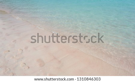 Pink Beach and Splash Wave in Komodo National Park, copy space, wide format