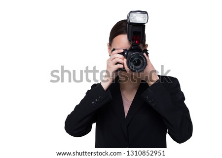 Asian Woman Photographer hold camera with external flash point to shoot subject, wear normal suit jacket. studio lighting white background isolated copy space, reporter journalist take photo celebrity
