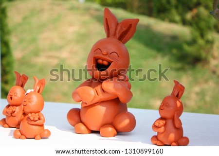 Rabbit family pottery, Rabbit smiling