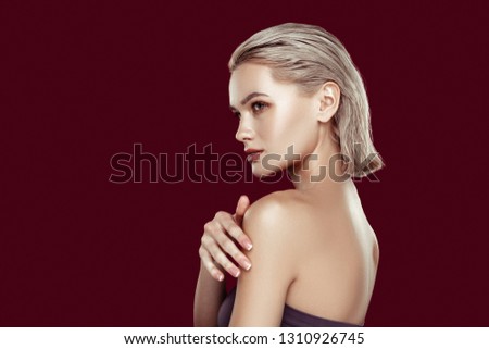 Nice complexion. Blonde-haired appealing woman with nice complexion posing for magazine