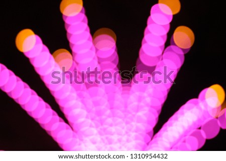 blur colors light beam of fluorescent light colorful in dark for festival temple fair background.