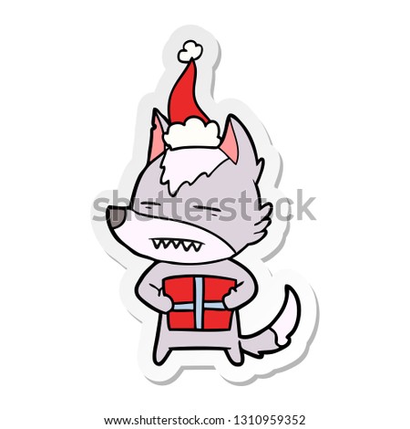 hand drawn sticker cartoon of a wolf with a gift wearing santa hat