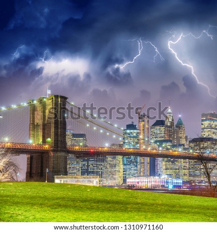 New York City with thunderstorm approaching - Manhattan skyline.