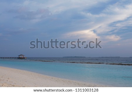 Sunset sky and a view at the pier, Maldive Islands, Indian Ocean