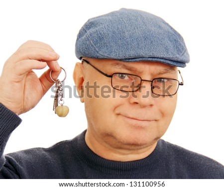 adult man holding a few keys, isolated on white background.