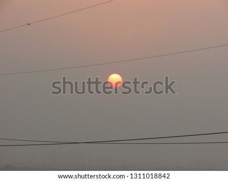 Close up big sunset, big orange Sun, beautiful scenic view of nature