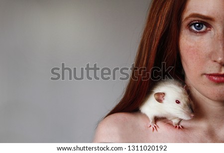 red-haired girl with rats