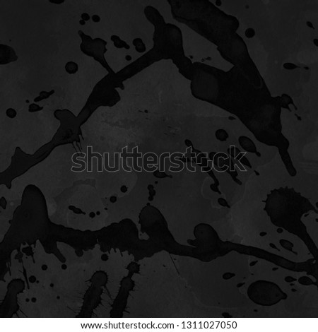 Black with gray paint splatter effect texture on gray paper background. Artistic backdrop. Different paint drops.