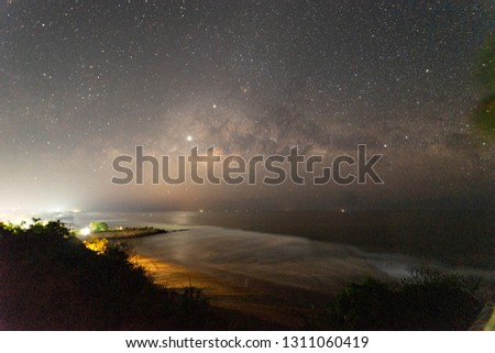 Milky Way on pacific ocean beach night