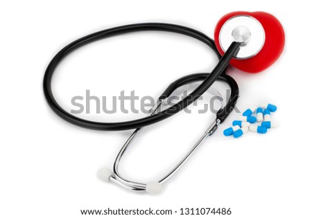 Medical,  stethoscope pills and heart on a white background.