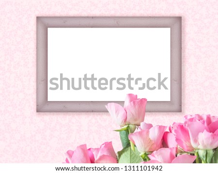 Wooden frame on a pink wall with a bunch of pink roses, romantic mock up