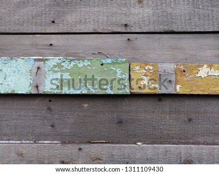 Old painted wood. Abstract background. Colorful pattern.