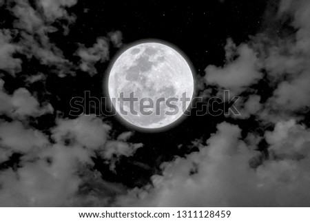 Full moon and white cloud in the dark night.
