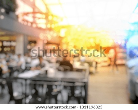 blurred image of people in coffee shop or cafe restaurant with abstract bokeh light image background for your photomontage or product display. vintage effect style picture